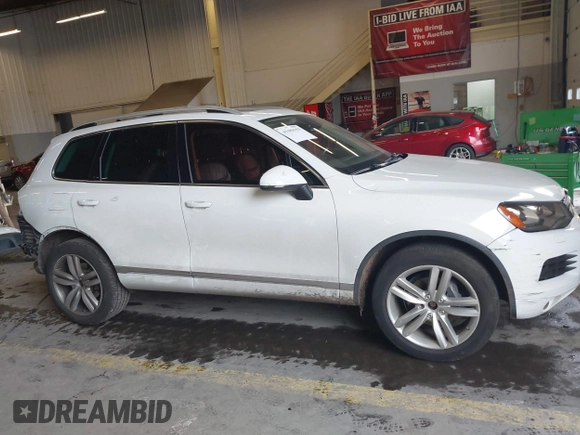 2013 Volkswagen Touareg Lux with VIN WVGEF9BP6DD007323, listed as a IAAI auction lot 41488959 with 123,383 mi miles and . Bid and sale history available at DreamBid. Image 14.