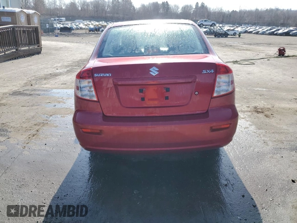 2012 Suzuki SX4 LE z VIN JS2YC5A34C6300969, wystawiony jako Copart lot #49036095 z przebiegiem 163 367 mil mil oraz Szkoda całkowita • Salvage title. Historia ofert i sprzedaży dostępna na DreamBid. Obrazek 6.