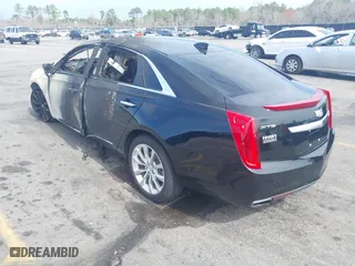 2016 Cadillac XTS Luxury Collection with VIN 2G61M5S39G9100596, listed as a IAAI auction lot 41738909 with 114,862 mi miles. Bid and sale history available at carsss.com. Image 3.
