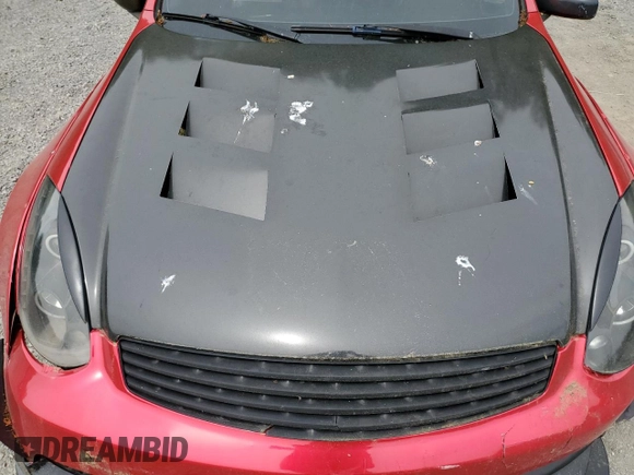 2003 Infiniti G35 w/Leather z VIN JNKCV54E53M207514, wystawiony jako Copart lot #58396655 z przebiegiem Nie podano mil oraz Szkoda całkowita • Salvage title. Historia ofert i sprzedaży dostępna na DreamBid. Obrazek 11.