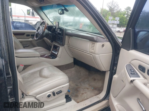 2003 Cadillac Escalade z VIN 1GYEK63N13R140496, wystawiony jako IAAI lot #42366303 z przebiegiem 90 940 mil mil oraz . Historia ofert i sprzedaży dostępna na DreamBid. Obrazek 5.
