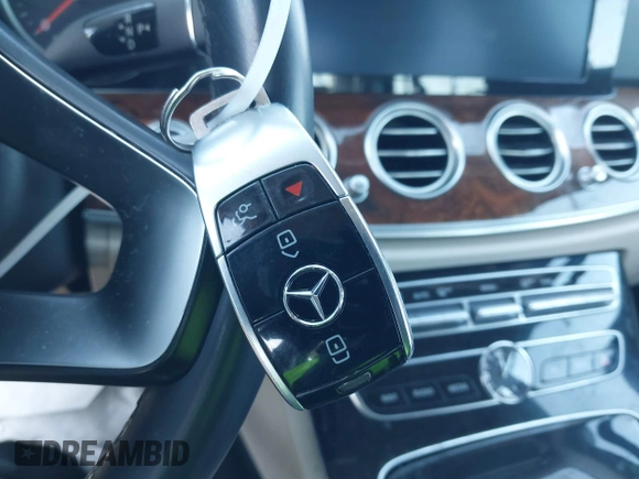 2018 Mercedes-Benz E 300 with VIN WDDZF4KB5JA365156, listed as a IAAI auction lot 41261324 with 73,718 mi miles and . Bid and sale history available at DreamBid. Image 11.