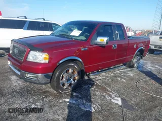 2005 Ford F-150 XLT with VIN 1FTPX12585NA02887, listed as a IAAI auction lot 41353228 with 162,863 mi miles. Bid and sale history available at carsss.com. Image 21.