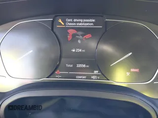 2021 BMW 4 Series 430i with VIN WBA53AP06MCG36919, listed as a IAAI auction lot 41863554 with 33,556 mi miles and . Bid and sale history available at DreamBid. Image 15.