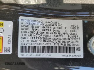 2023 Honda Civic Sport z VIN 2HGFE2F53PH558023, wystawiony jako Copart lot #54541695 z przebiegiem Nie podano mil oraz Szkoda całkowita • Salvage title. Historia ofert i sprzedaży dostępna na DreamBid. Obrazek 13.