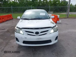 2012 Toyota Corolla L with VIN 5YFBU4EE5CP044613, listed as a IAAI auction lot 42113624 with 208,780 mi miles and . Bid and sale history available at carsss.com. Image 12.