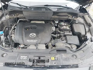 2018 Mazda CX-5 Grand Touring with VIN JM3KFADM4J0326760, listed as a IAAI auction lot 41885100 with 82,091 mi miles and . Bid and sale history available at DreamBid. Image 10.