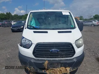 2016 Ford Transit Cargo with VIN 1FTYE1ZM9GKB17364, listed as a IAAI auction lot 42702871 with 142,000 mi miles and . Bid and sale history available at DreamBid. Image 12.