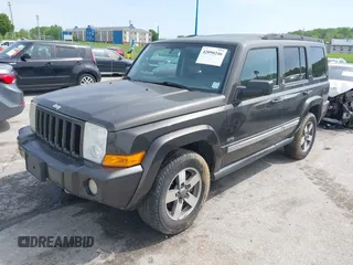2006 Jeep Commander with VIN 1J8HG48K86C363187, listed as a IAAI auction lot 42090246 with 140,956 mi miles. Bid and sale history available at carsss.com. Image 2.