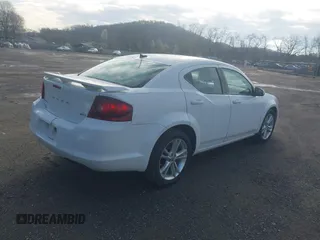 2013 Dodge Avenger SXT with VIN 1C3CDZCB0DN548158, listed as a IAAI auction lot 41969453 with 146,304 mi miles and . Bid and sale history available at DreamBid. Image 4.
