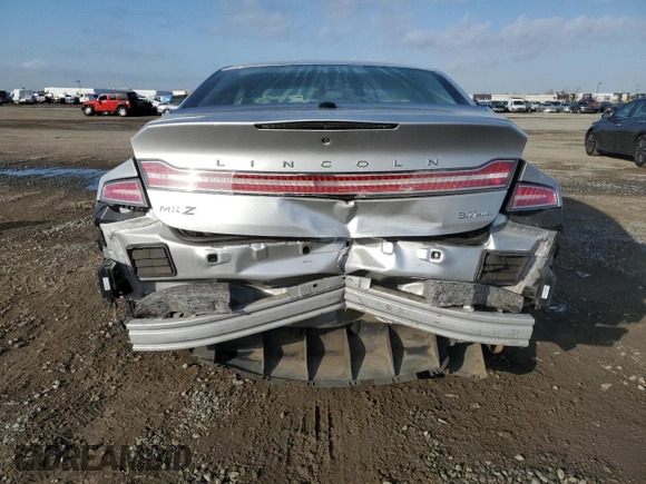 2014 Lincoln MKZ with VIN 3LN6L2JKXER806539, listed as a Copart auction lot 42724215 with 104,283 mi miles and Salvage title. Bid and sale history available at DreamBid. Image 6.
