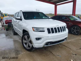 2014 Jeep Grand Cherokee Overland with VIN 1C4RJFCT4EC337564, listed as a IAAI auction lot 41982886 with 191,412 mi miles. Bid and sale history available at carsss.com. Image 1.