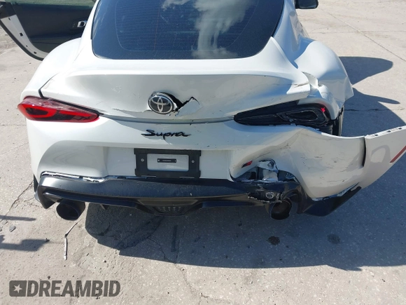 2024 Toyota Supra 3.0 with VIN WZ1DB0G02RW066224, listed as a IAAI auction lot 42243491 with 20,672 mi miles and . Bid and sale history available at DreamBid. Image 6.