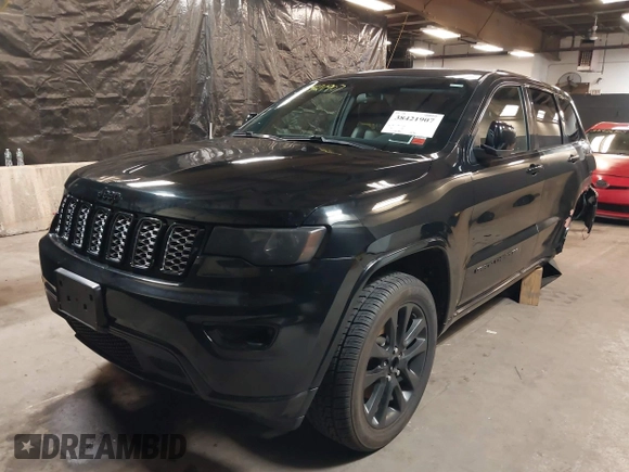 2021 Jeep Grand Cherokee Laredo X with VIN 1C4RJFAG3MC647726, listed as a IAAI auction lot 38421907 with 56,514 mi miles and . Bid and sale history available at DreamBid. Image 2.