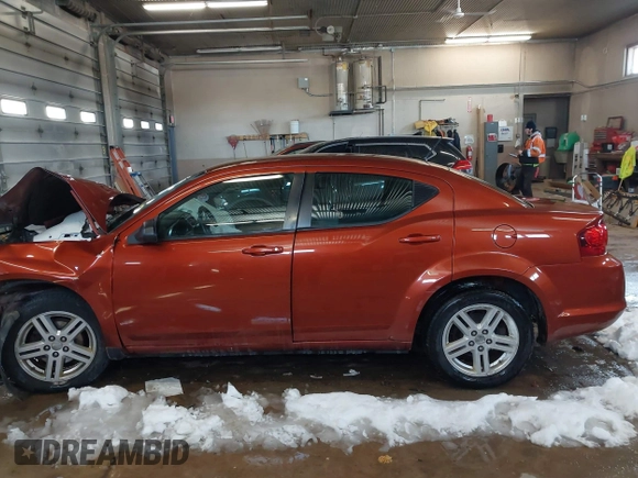 2012 Dodge Avenger SXT with VIN 1C3CDZCB0CN154559, listed as a IAAI auction lot 41618230 with 171,497 mi miles and . Bid and sale history available at DreamBid. Image 14.