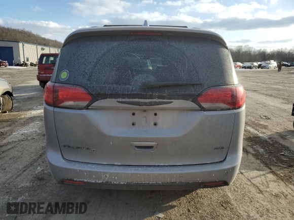 2020 Chrysler Pacifica Launch Edition with VIN 2C4RC3BG7LR289222, listed as a Copart auction lot 45941595 with 58,631 mi miles and Salvage title. Bid and sale history available at DreamBid. Image 6.