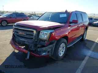 2015 GMC Yukon XL SLT with VIN 1GKS2HKC0FR585406, listed as a IAAI auction lot 41412441 with 210,321 mi miles. Bid and sale history available at carsss.com. Image 6.