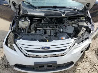2013 Ford Fiesta SE z VIN 3FADP4EJ8DM146676, wystawiony jako Copart lot #55565485 z przebiegiem 168 801 mil mil oraz Szkoda całkowita • Salvage title. Historia ofert i sprzedaży dostępna na DreamBid. Obrazek 11.