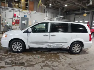 2015 Chrysler Town & Country Touring with VIN 2C4RC1BG0FR628721, listed as a IAAI auction lot 41101486 with 125,942 mi miles. Bid and sale history available at carsss.com. Image 6.