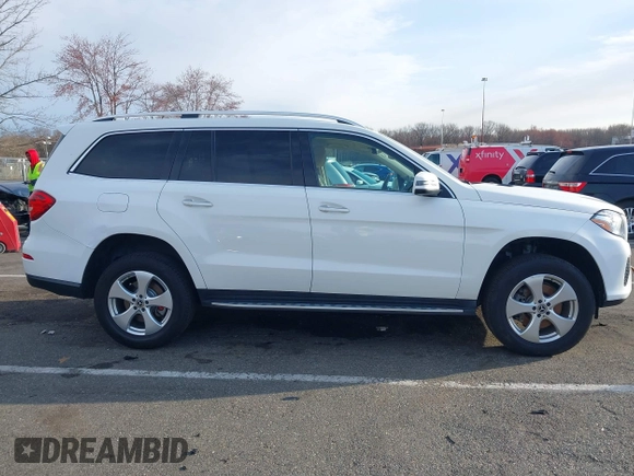 2019 Mercedes-Benz GLS 450 with VIN 4JGDF6EE3KB233297, listed as a IAAI auction lot 41882975 with 130,354 mi miles and . Bid and sale history available at DreamBid. Image 13.