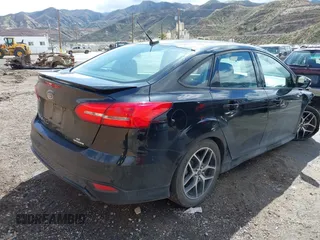 2016 Ford Focus SE with VIN 1FADP3F29GL209601, listed as a IAAI auction lot 41744560 with 68,058 mi miles. Bid and sale history available at carsss.com. Image 4.