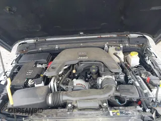 2020 Jeep Gladiator Rubicon z VIN 1C6JJTBG7LL181833, wystawiony jako IAAI lot #42493073 z przebiegiem 13 775 mil mil oraz . Historia ofert i sprzedaży dostępna na DreamBid. Obrazek 10.