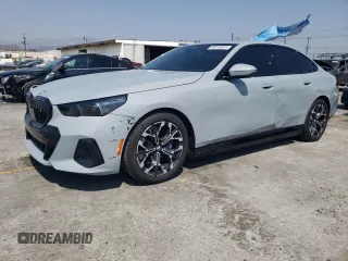 2024 BMW i5 eDrive40 with VIN WBY33FK09RCR17369, listed as a Copart auction lot 65018825 with 3,853 mi miles and Clean title. Bid and sale history available at DreamBid. Image 1.