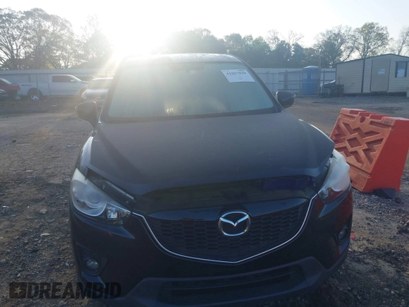 2015 Mazda CX-5 Grand Touring with VIN JM3KE4DY6F0513173, listed as a IAAI auction lot 41867030 with 93,770 mi miles. Bid and sale history available at carsss.com. Image 12.