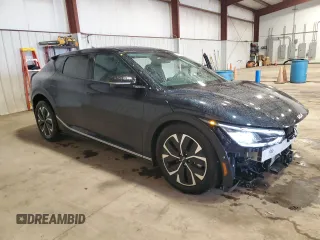 2024 Kia EV6 Wind with VIN KNDC3DLC0R5221048, listed as a Copart auction lot 51476745 with 4,652 mi miles and Salvage Title. Bid and sale history available at carsss.com. Image 4.