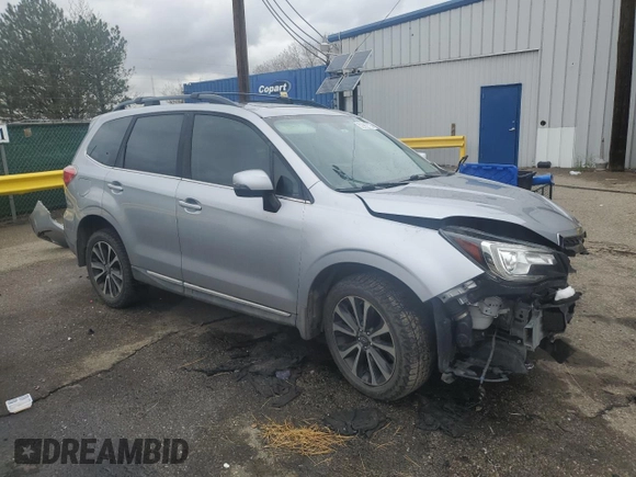 2017 Subaru Forester Touring with VIN JF2SJGWC0HH457440, listed as a Copart auction lot 52962175 with Not provided miles and Salvage title. Bid and sale history available at DreamBid. Image 4.