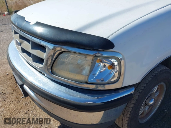 1998 Ford F-150 z VIN 1FTZX1726WKB46576, wystawiony jako IAAI lot #41881427 z przebiegiem 168 864 mil mil oraz . Historia ofert i sprzedaży dostępna na DreamBid. Obrazek 6.