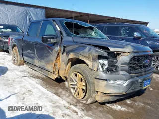 2021 Ford F-150 XL with VIN 1FTEW1C51MFC94173, listed as a IAAI auction lot 41628222 with 23,266 mi miles. Bid and sale history available at carsss.com. Image 1.