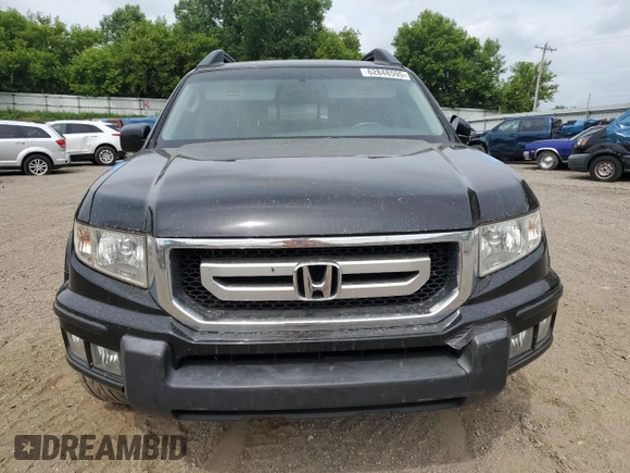 2010 Honda Ridgeline RTL with VIN 5FPYK1F5XAB014004, listed as a Copart auction lot 62848595 with 131,920 mi miles and Clean title. Bid and sale history available at DreamBid. Image 5.