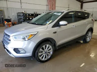 2017 Ford Escape Titanium with VIN 1FMCU0J9XHUA64948, listed as a Copart auction lot 48911225 with 127,346 mi miles and Clean Title. Bid and sale history available at carsss.com. Image 1.
