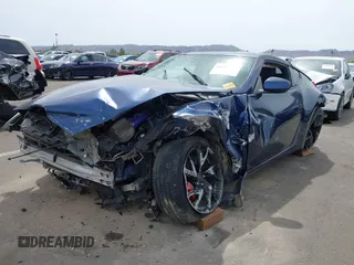 2013 Nissan 370Z z VIN JN1AZ4EH2DM380511, wystawiony jako IAAI lot #41912193 z przebiegiem Nie podano mil oraz . Historia ofert i sprzedaży dostępna na DreamBid. Obrazek 2.