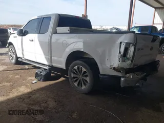 2015 Ford F-150 XL with VIN 1FTEX1CP0FKE84653, listed as a IAAI auction lot 41794451 with 156,552 mi miles. Bid and sale history available at carsss.com. Image 3.