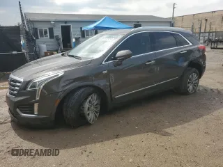 2019 Cadillac XT5 Luxury FWD z VIN 1GYKNCRS9KZ147779, wystawiony jako Copart lot #56929255 z przebiegiem 95 876 mil mil oraz Szkoda całkowita • Salvage title. Historia ofert i sprzedaży dostępna na DreamBid. Obrazek 1.