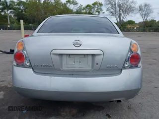 2004 Nissan Altima S with VIN 1N4AL11D04C130857, listed as a IAAI auction lot 41661519 with 147,518 mi miles. Bid and sale history available at carsss.com. Image 17.