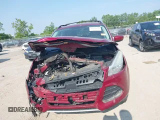 2013 Ford Escape SE z VIN 1FMCU0GX6DUD33172, wystawiony jako IAAI lot #42422870 z przebiegiem 155 696 mil mil oraz . Historia ofert i sprzedaży dostępna na DreamBid. Obrazek 12.
