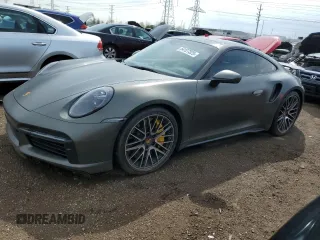 2023 Porsche 911 Turbo z VIN WP0AD2A99PS257416, wystawiony jako Copart lot #54127325 z przebiegiem 7 252 mil mil oraz Szkoda całkowita • Salvage title. Historia ofert i sprzedaży dostępna na DreamBid. Obrazek 1.