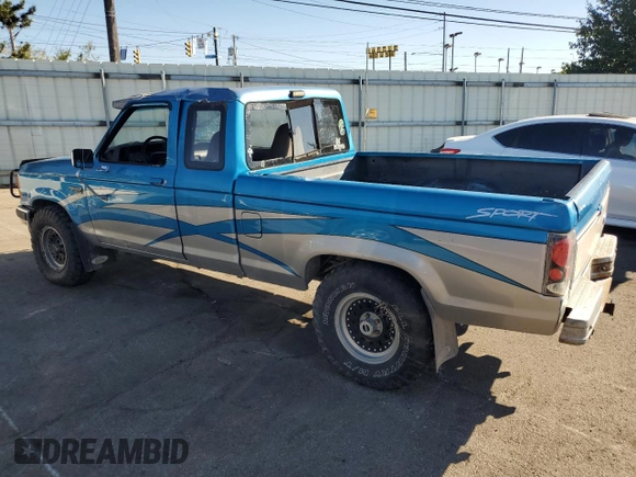1991 Ford Ranger with VIN 1FTCR15T2MTA45652, listed as a Copart auction lot 76089874 with 90,947 mi miles and Salvage Title. Bid and sale history available at DreamBid. Image 2.