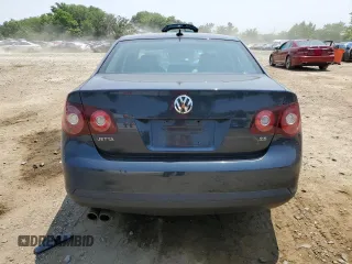2009 Volkswagen Jetta SE with VIN 3VWRZ71K09M077240, listed as a Copart auction lot 60546435 with 134,670 mi miles and Salvage title. Bid and sale history available at DreamBid. Image 6.