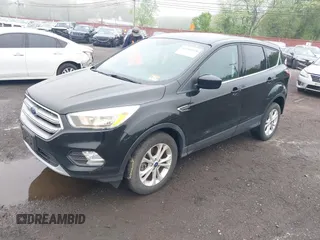 2017 Ford Escape SE with VIN 1FMCU9GD3HUD90154, listed as a IAAI auction lot 42181078 with 106,143 mi miles and . Bid and sale history available at DreamBid. Image 2.