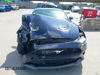 2021 Ford Mustang EcoBoost with VIN 1FA6P8TH7M5134461, listed as a IAAI auction lot 42526727 with 56,494 mi miles and . Bid and sale history available at DreamBid. Image 12.