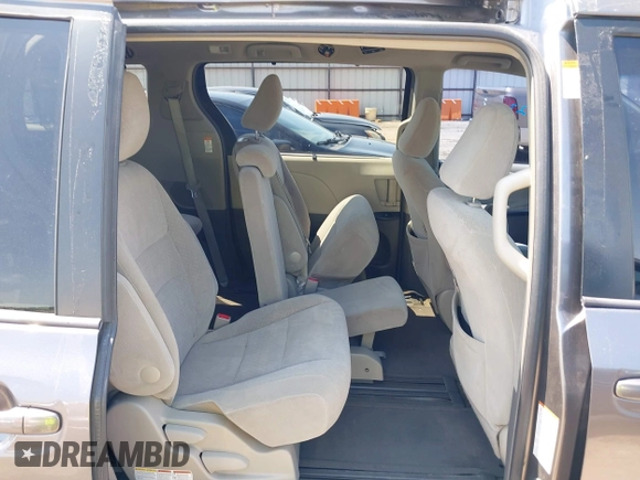 2015 Toyota Sienna LE AAS with VIN 5TDKK3DC4FS617903, listed as a IAAI auction lot 42390155 with 151,975 mi miles and . Bid and sale history available at DreamBid. Image 8.