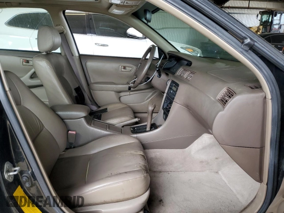 1998 Toyota Camry LE z VIN JT2BF28KXW0141801, wystawiony jako Copart lot #48014915 z przebiegiem 189 656 mil mil oraz Czysty tytuł • Clean title. Historia ofert i sprzedaży dostępna na DreamBid. Obrazek 7.