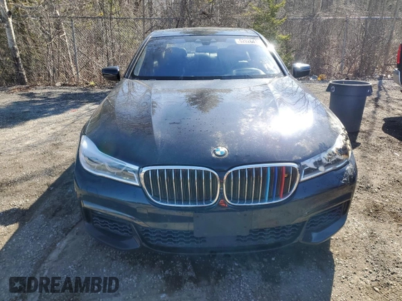 2017 BMW 7 Series 750i xDrive with VIN WBA7B0C55HG527032, listed as a Copart auction lot 52026415 with 67,722 mi miles and Clean title. Bid and sale history available at DreamBid. Image 5.
