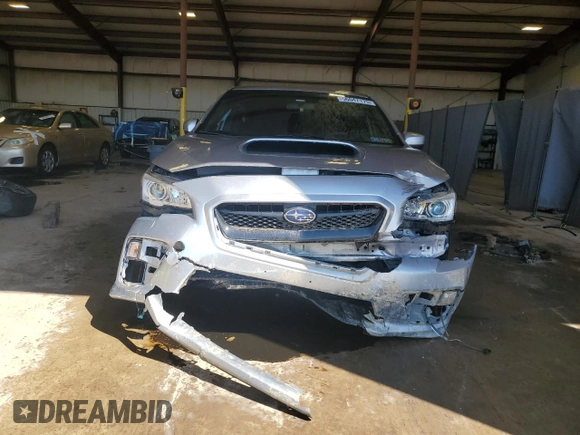 2017 Subaru WRX Premium z VIN JF1VA1E6XH9802803, wystawiony jako Copart lot #56047175 z przebiegiem 48 597 mil mil oraz Szkoda całkowita • Salvage title. Historia ofert i sprzedaży dostępna na DreamBid. Obrazek 5.