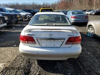 2002 Mazda Millenia S z VIN JM1TA222521733260, wystawiony jako Copart lot #49984755 z przebiegiem 140 212 mil mil oraz Szkoda całkowita • Salvage title. Historia ofert i sprzedaży dostępna na DreamBid. Obrazek 6.