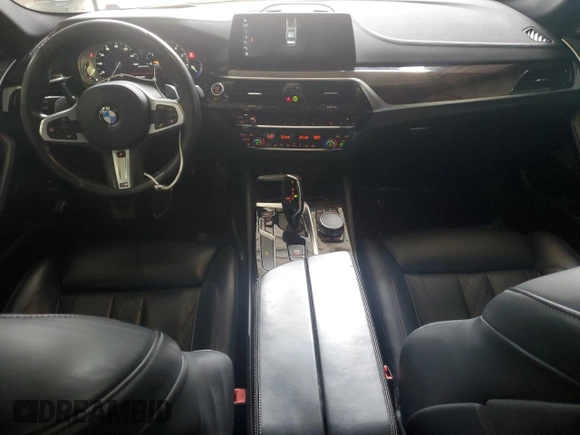 2018 BMW 5 Series M550i xDrive with VIN WBAJB9C58JB035267, listed as a Copart auction lot 64616605 with 125,365 mi miles and Clean title. Bid and sale history available at DreamBid. Image 8.